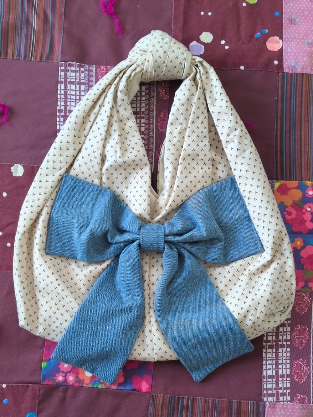 Beige Patterned Hobo Bag with Blue Bow Accent